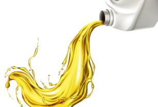 Car lubricant spilling from blank bottle vector